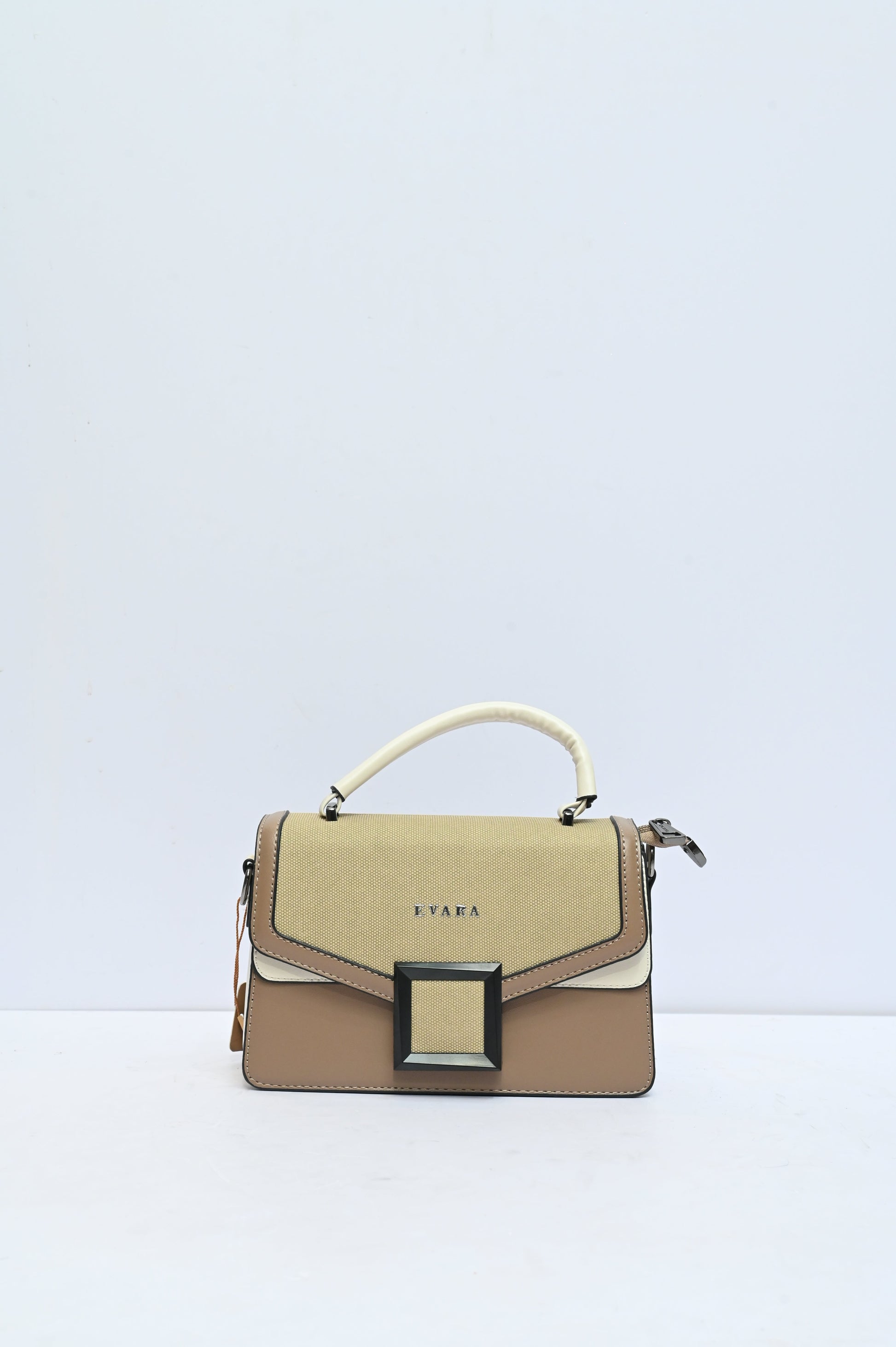 Elegant Structured Handbag with Statement Buckle for Women Featuring Premium Design and Spacious Interior