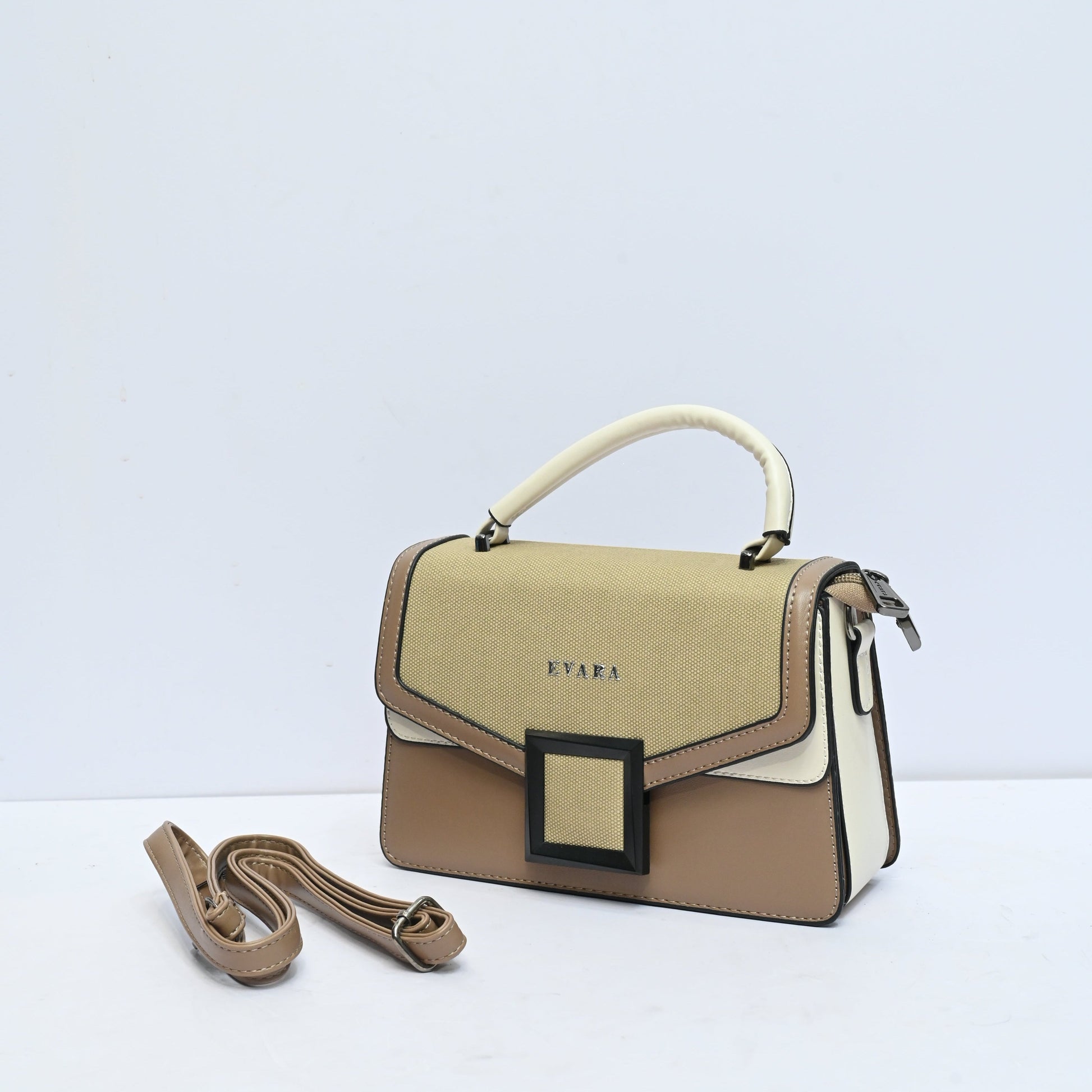 Elegant Structured Handbag with Statement Buckle for Women Featuring Premium Design and Spacious Interior